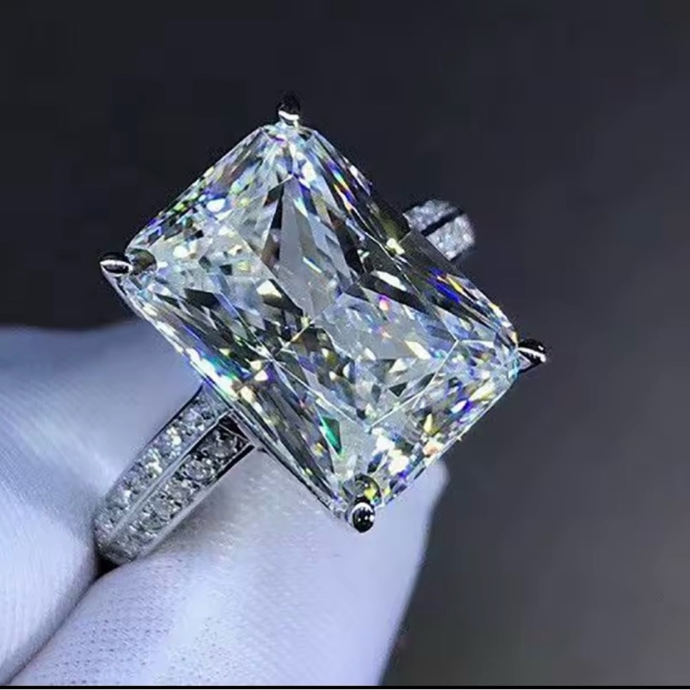 Sparkling Emerald-Cut Solitaire Ring in White with Pavé Band